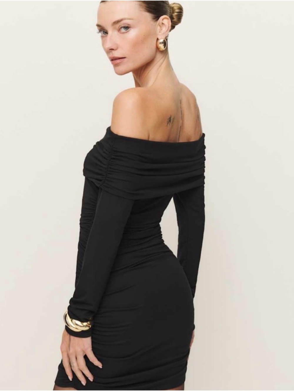 Reformation Off-Shoulder Ruched Mini Dress in Black